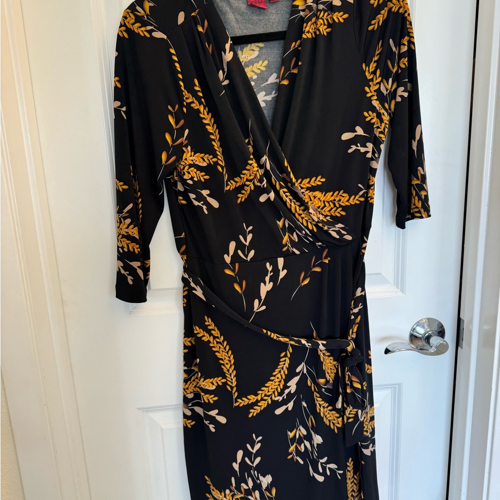 Elegant Black and Gold Wrap Dress